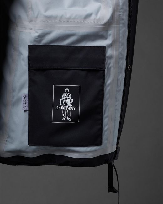 C P Company Blue Logo-Print Two-Pocket Windbreaker for men