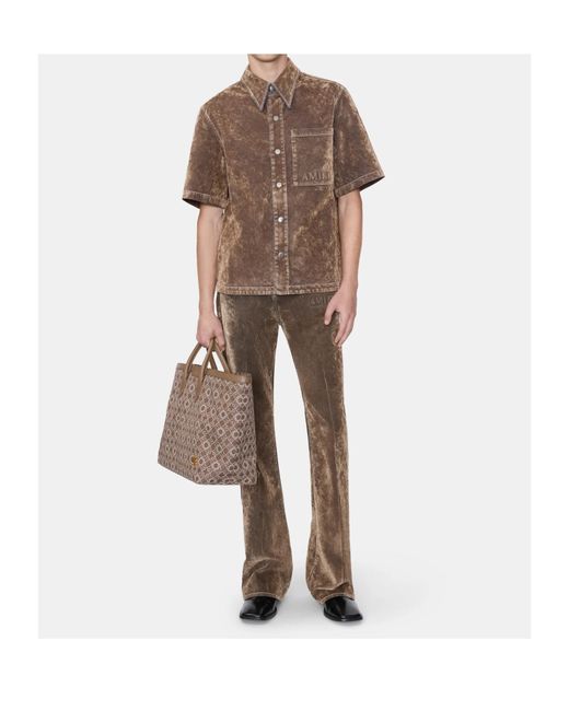 Amiri Brown Logo Embroidered Velvet Jeans for men