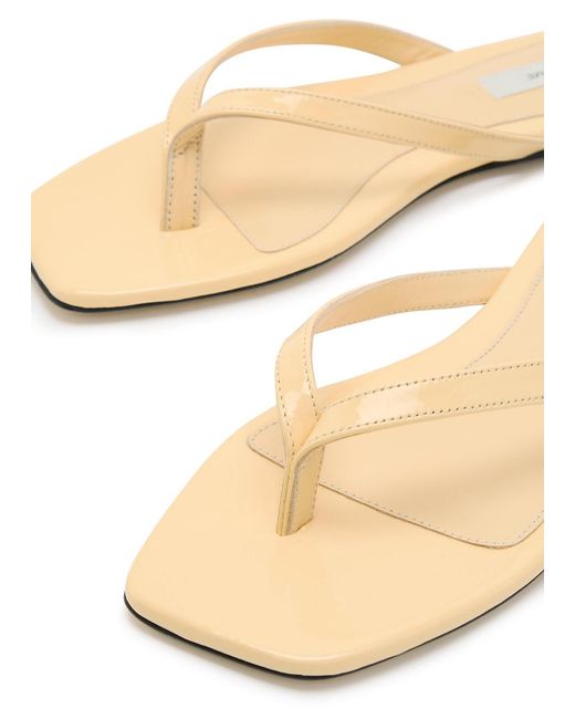 Totême Natural Patent Leather Flip Flops
