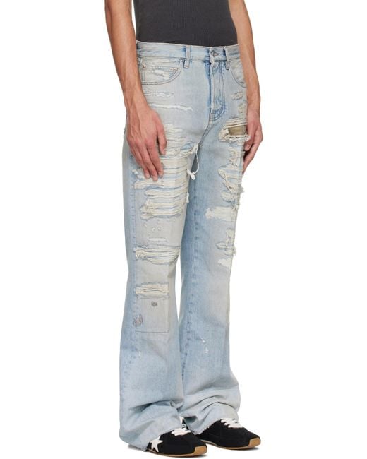 Amiri Blue Distressed Boot Cut Jeans for men