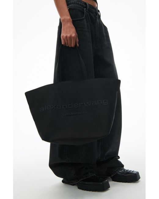 Alexander Wang Black Logo Embossed Ponch Tote Bag
