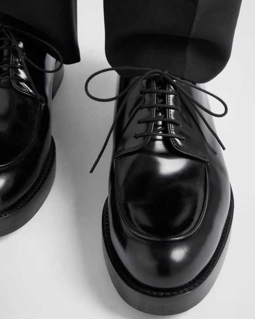 Prada Black Brushed Leather Derby Shoes for men