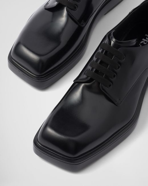 Prada Black Brushed Leather Derby Shoes for men