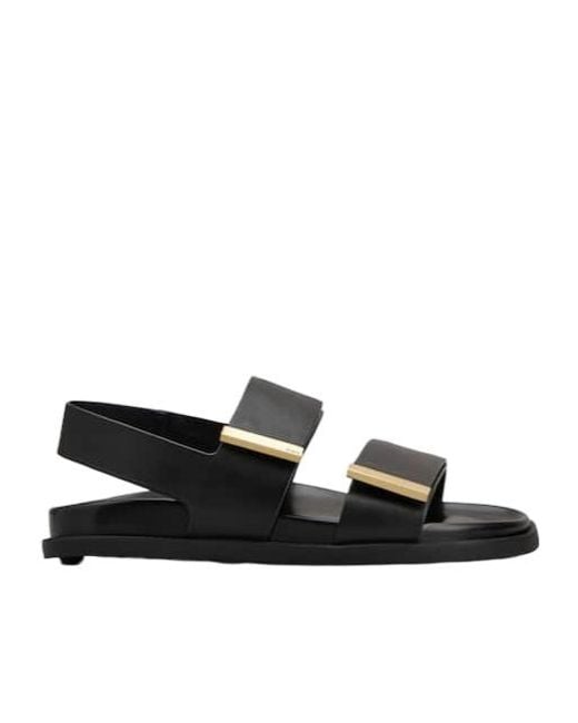 Tod's Black Logo Engraved Slip-On Sandals