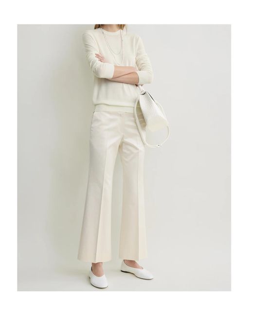Totême White Totême Kick Flare Raw-Edge Pants