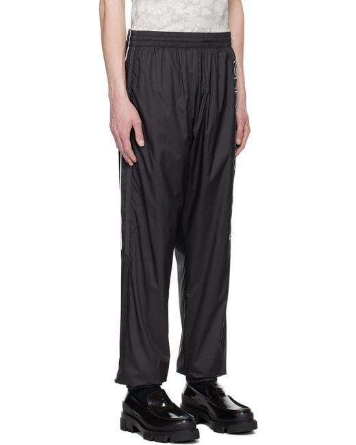 Givenchy Black Logo Embroidered Track Pants for men