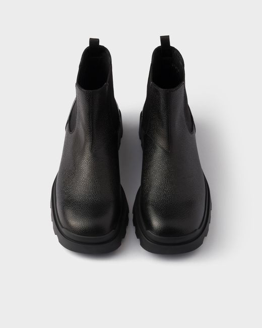 Prada Black Stamped Leather Chelsea Boots for men