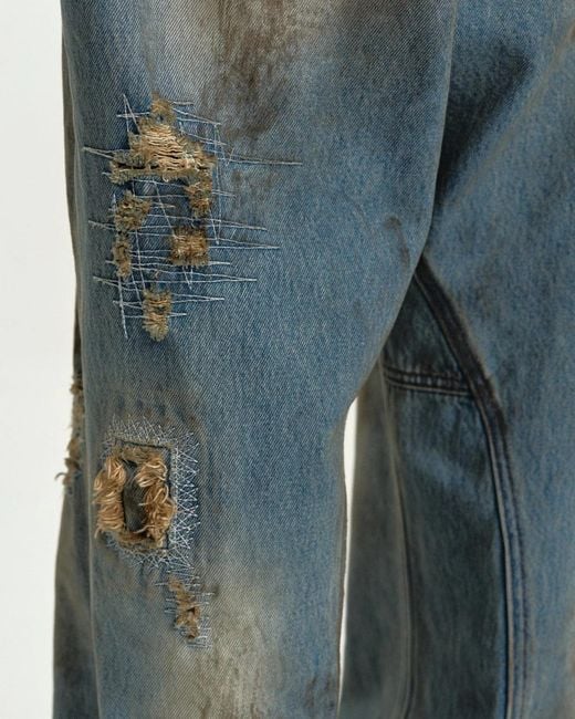 ANDERSSON BELL Blue Destroyed Wide-Leg Jeans for men