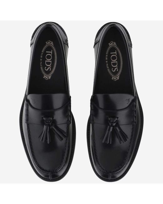 Tod's Black Round Toe Slip-On Loafers for men