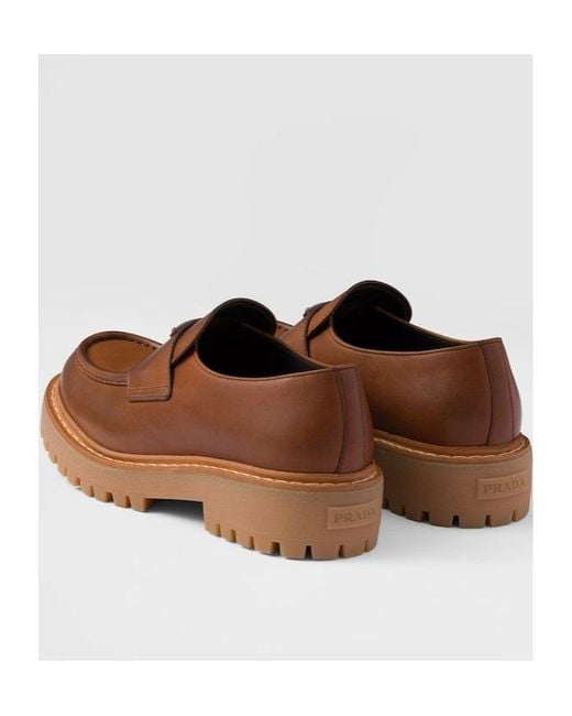 Prada Brown Logo Plaque Round Toe Loafers for men