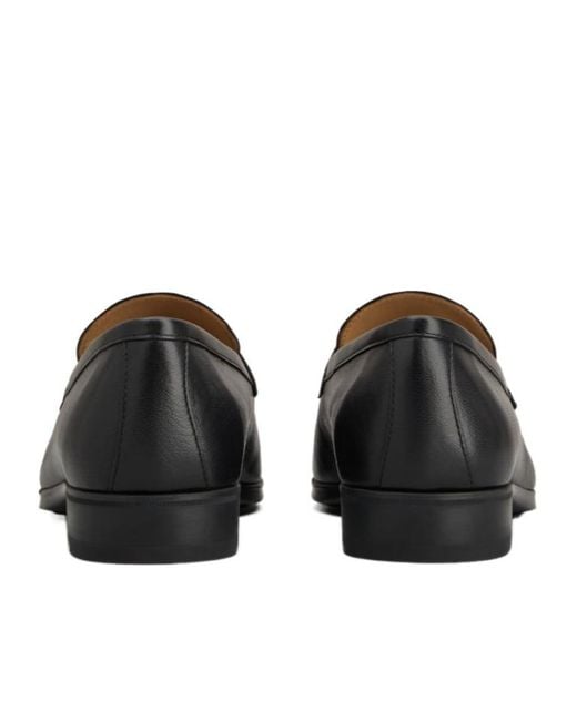 Tod's Black Logo Debossed Loafers for men
