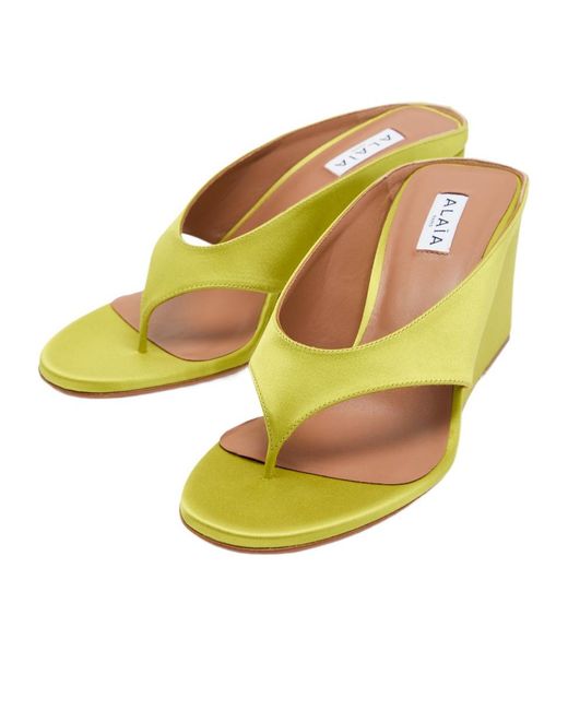 Alaïa Yellow Satin Block Heel Slippers