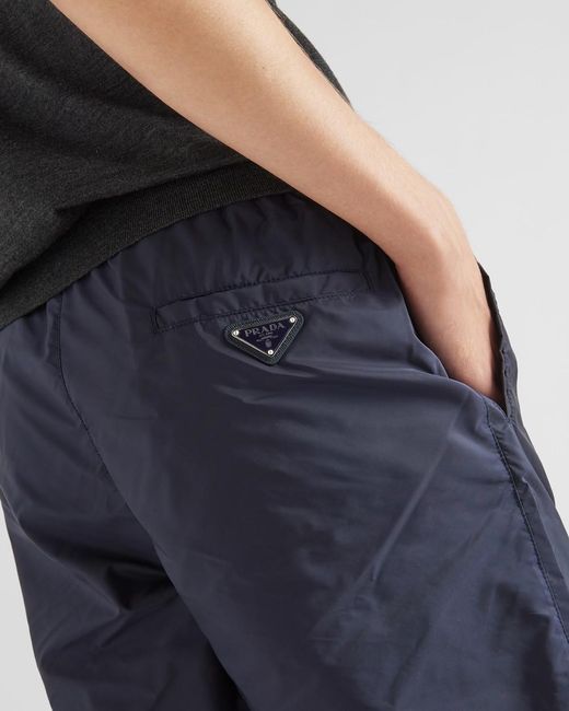 Prada Blue Triangle Logo Plaque Elastic Swim Shorts for men