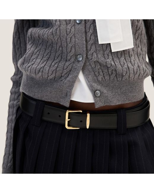 Miu Miu Black Logo-Appliqué Pleated Mini Skirt