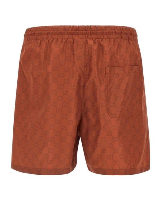Gucci Orange Monogrammed Drawstring Swimwear for men