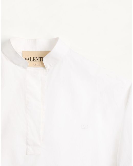 Valentino White Curved Hem Long-Sleeved Top