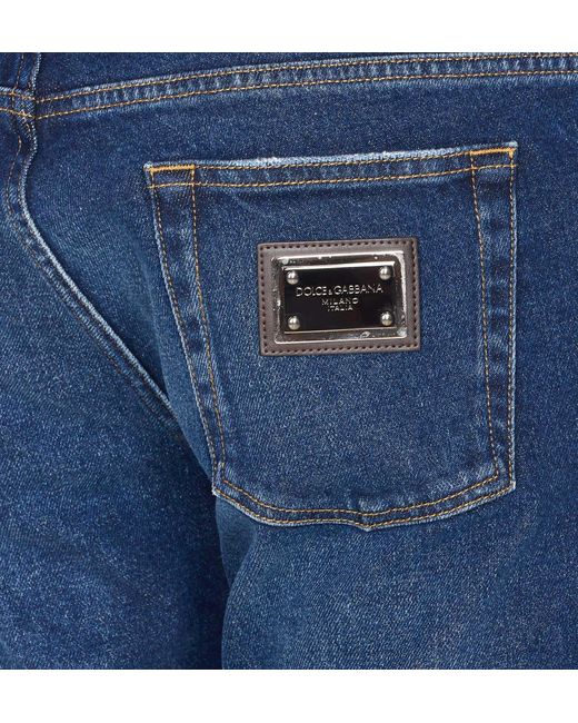 Dolce & Gabbana Blue Logo Plaque Slim-Fit Jeans for men