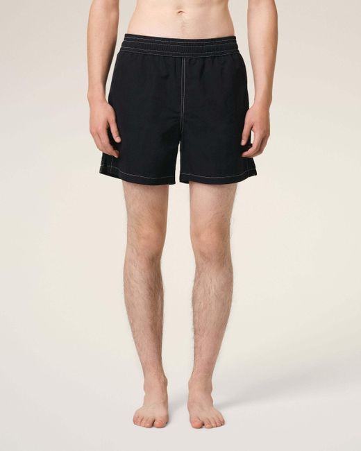 AMI Black Logo Embroidered Swim Shorts for men