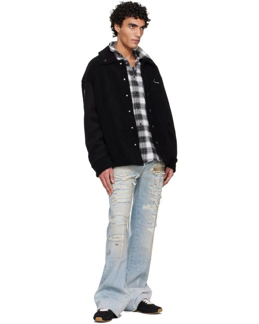 Amiri Blue Distressed Boot Cut Jeans for men