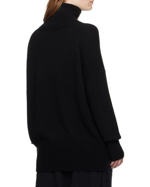 Lisa Yang Blue Turtleneck Sweater