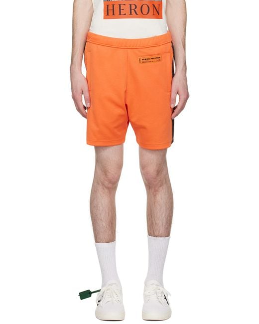 Heron Preston Orange Logo Shorts for men