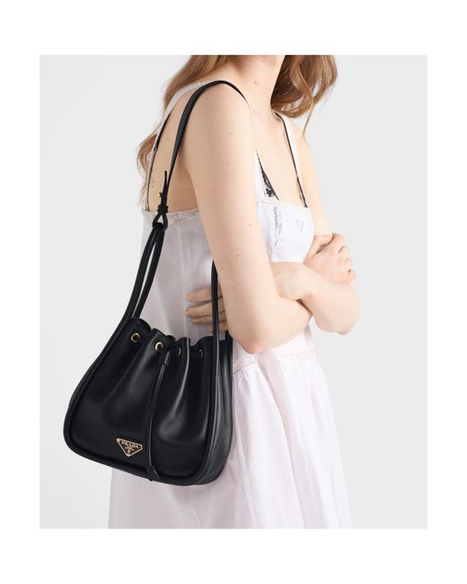 Prada Black Logo Plaque Drawstring Bucket Bag