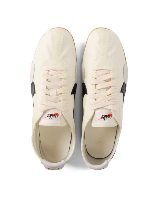Nike White Mixedupper Running Shoe