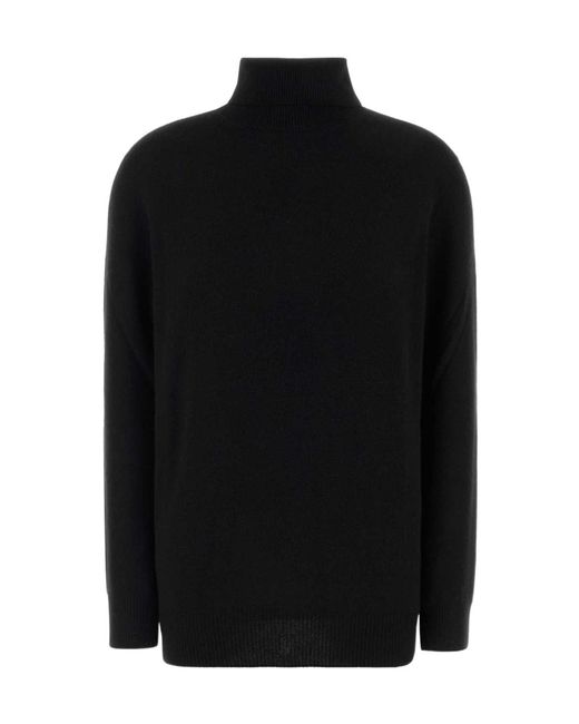 The Row Black Long-Sleeved Turtleneck Sweater