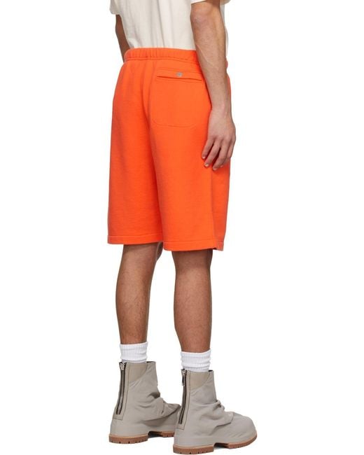 Heron Preston Orange Logo Patch Bermuda Shorts for men
