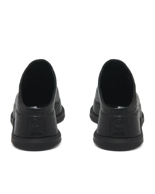 McQueen Black Wave Skull Embossed Mules