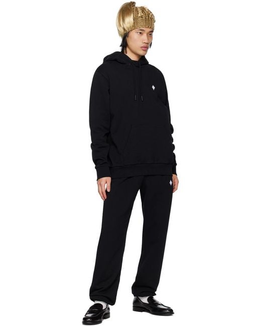 Marcelo Burlon Black Logo Loose Sweatpants for men
