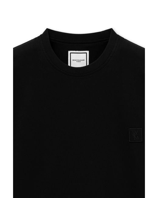 Wooyoungmi Black T-Shirt With Floral Pattern On The Back for men