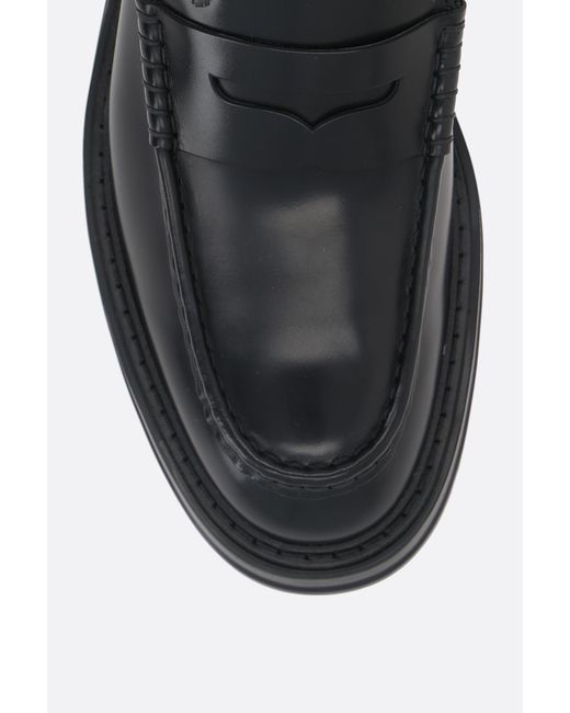 Tod's Black Almond Toe Penny Loafers for men