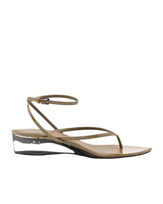 Alaïa White V-Strap Flat Sandals