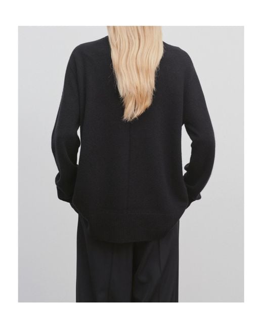 The Row Black Turtleneck Sweater