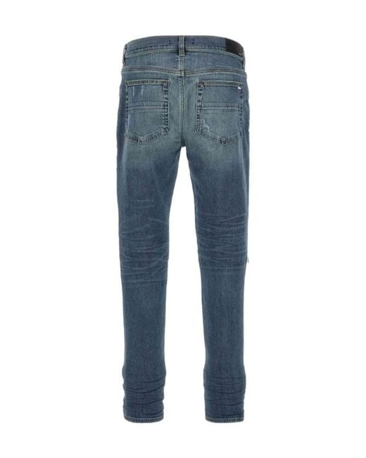 Amiri Blue Ripped Jeans for men