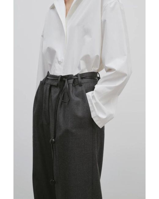 The Row Black Pleat-Front Wide-Leg Trousers