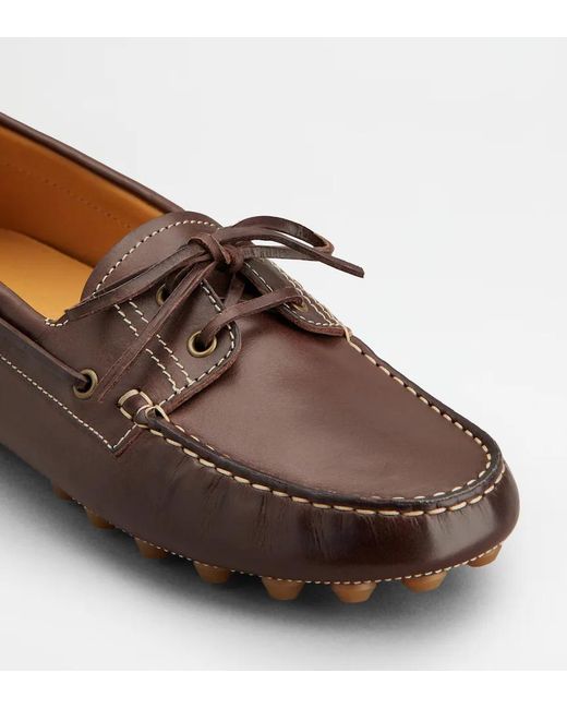 Tod's Brown Laced Boat Shoes for men