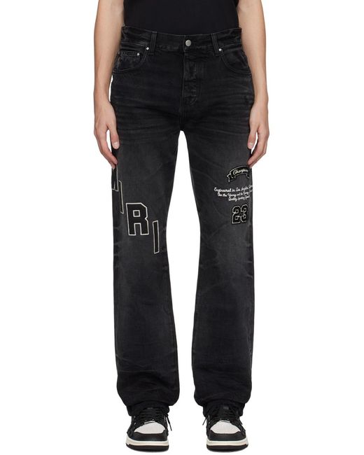 Amiri Black Logo-Embroidered Faded Jeans for men