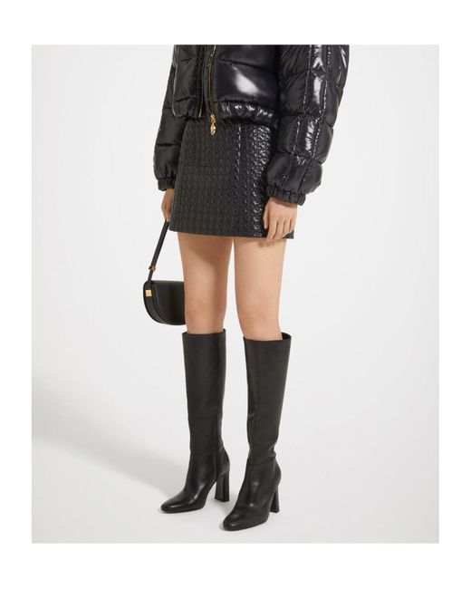 Patou Black High Waist Quilted Shell Mini Skirt