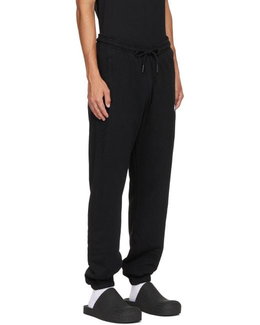 Marcelo Burlon Black Logo Loose Sweatpants for men