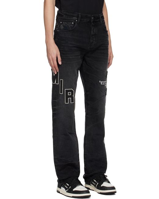 Amiri Black Logo-Embroidered Faded Jeans for men