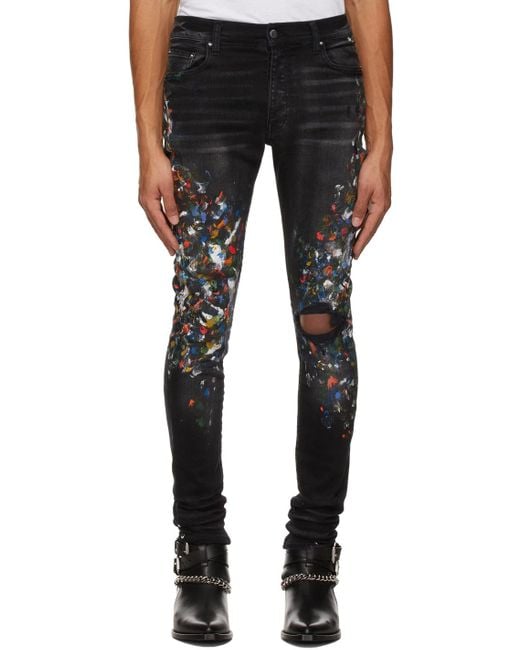 Amiri Black Paint Print Distressed Skinny Jeans for men