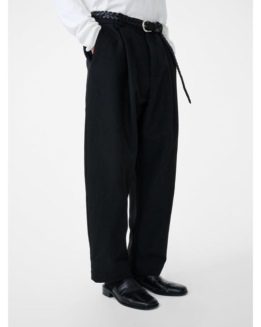 Studio Nicholson Black Tuck Trousers for men