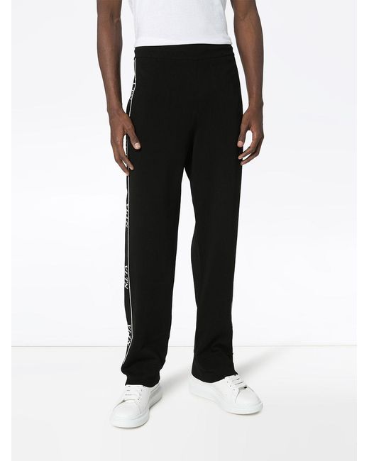 Valentino Black Ticker Logo-Print Track Pants for men