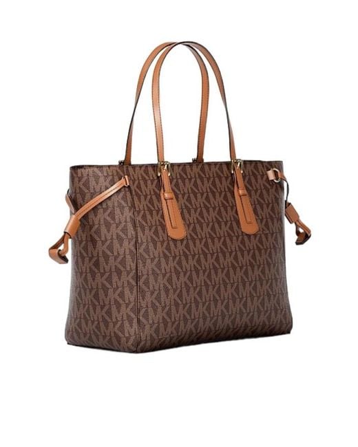 Michael Kors Brown Voyager Extra-Small Signature Logo Convertible Crossbody Bag