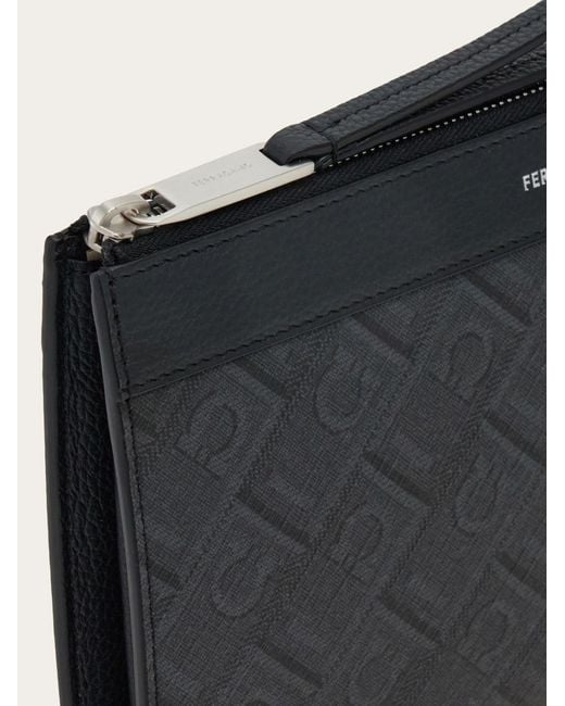 Ferragamo Black Ferragamo Monogram Printed Zipped Wristlet Bag for men