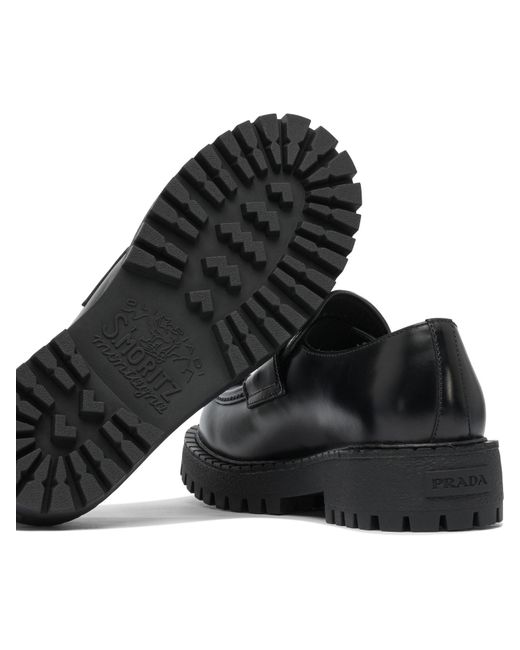 Prada Black Logo Plaque Slip-On Loafers for men