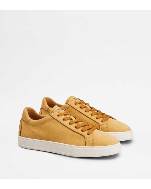 Tod's Yellow Logo Stamped Lace Up Sneakers for men