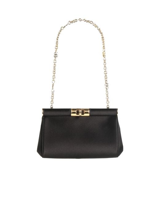 Dolce & Gabbana White Clutch Handbags
